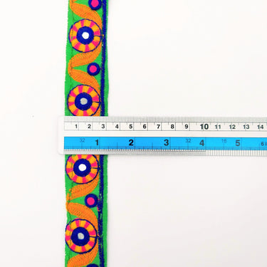 Green Mirrored Fabric Trim With Orange, Yellow, Blue And Pink Embroidery